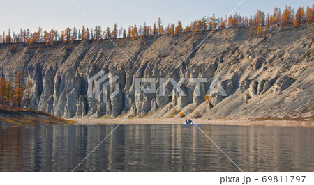 Larch taiga in September on the banks of the river and in Evenkia Larch taiga in September on the banks of the river and in Evenkia 69811797
