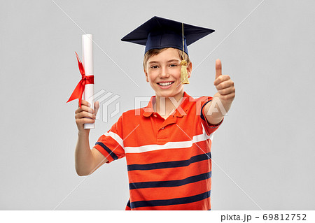 graduate student boy in mortarboard with diploma graduate student boy in mortarboard with diploma 69812752