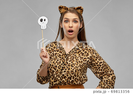 surprised woman in halloween costume of leopard surprised woman in halloween costume of leopard 69813356