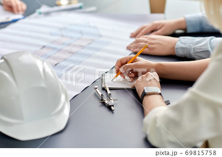 architect with notebook working at office architect with notebook working at office 69815758