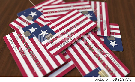 Pile of credit cards with flag of Liberia. 3D rendering Pile of credit cards with flag of Liberia. 3D rendering 69818776