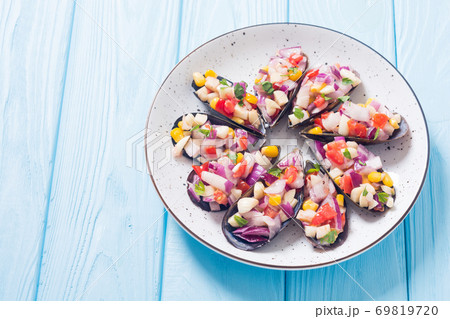 Traditional  Peruvian food background with mussels 69819720