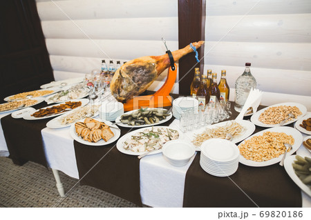 Interior of a restaurant prepared for wedding ceremony Interior of a restaurant prepared for wedding ceremony 69820186