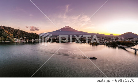 Aerial view over lake Kawaguchi, located in the border Fujikawaguchiko and Minobu, southern Yamanashi Prefecture near Mount Fuji, Japan. Lake Kawaguchi is a very popular tourist spot near Fuji Japan. 69821570