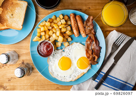 traditional american breakfast on wooden table 69826097