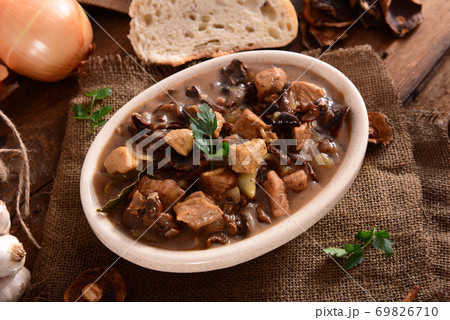 Stew with meat, mushrooms and vegetables Stew with meat, mushrooms and vegetables 69826710