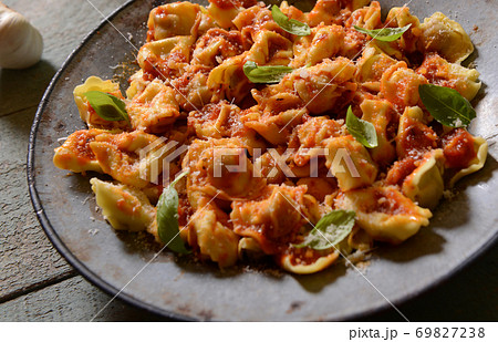 Ravioli with tomato sauce 69827238