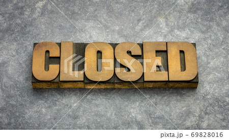 closed word abstract in wood type 69828016