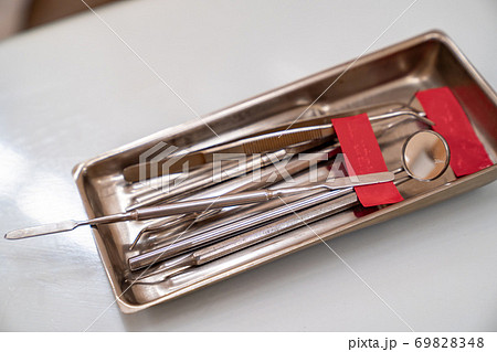 sanitized metal tools for job of a dentist 69828348