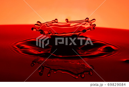 Colorful water splash 69829084