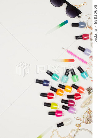 concept, manicure with nail polish, pedicure on white background, copy space, Flat Lay concept, manicure with nail polish, pedicure on white background, copy space, Flat Lay 69830608
