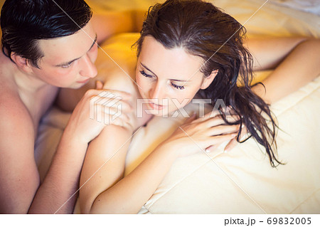 couple after shower in bed. couple after shower in bed. 69832005