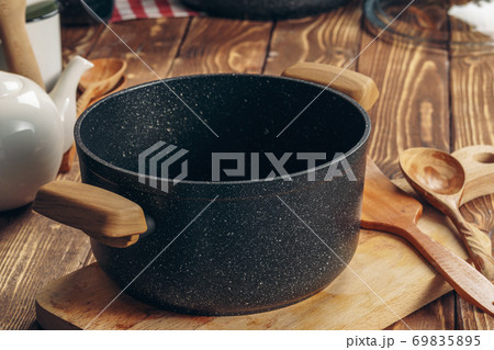Set of cookware utensils on a kitchen counter Set of cookware utensils on a kitchen counter 69835895