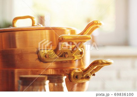 Close up of a set of copper cookware 69836100