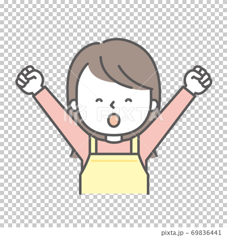 A woman in an apron raising her fists in both hands A woman in an apron raising her fists in both hands 69836441