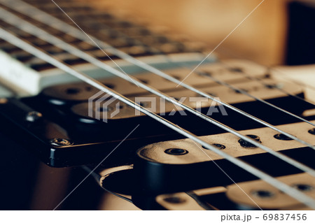 Close up photo of electric guitar fingerboard Close up photo of electric guitar fingerboard 69837456