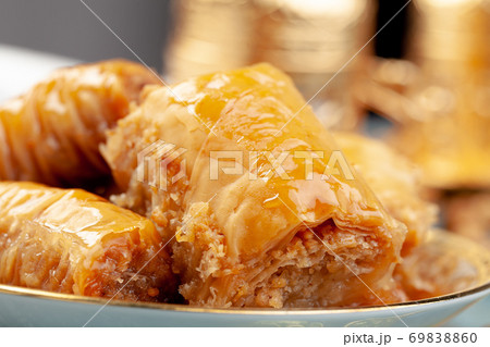 Stacked turkish baklava dessert in a plate close up 69838860