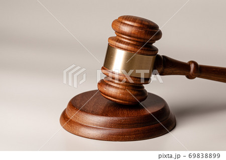 Wooden judges gavel on table close up 69838899