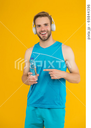 Stay hydrated when training. Happy guy point finger Stay hydrated when training. Happy guy point finger 69844396