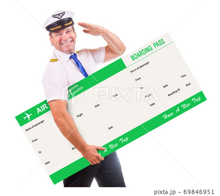 A cheerful pilot hold air ticket and salute with his hand, isolated on white background.  69846951