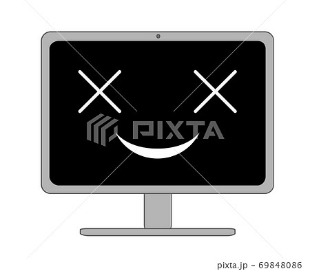 怖い笑いの表情つき黒い画面のデスクトップパソコン 69848086