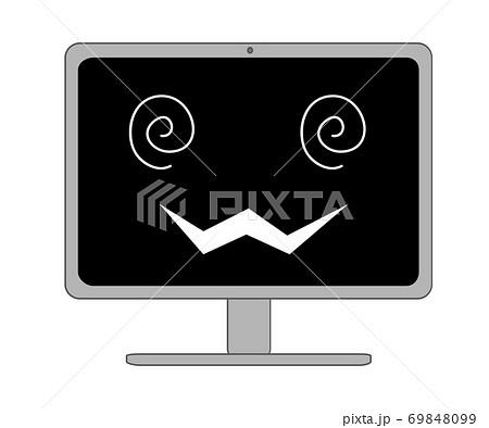 怖い笑いを浮かべる黒い画面のデスクトップパソコン 69848099
