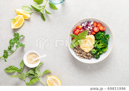 Vegetarian Buddha bowl with quinoa, vegetables and hummus, healthy food concept Vegetarian Buddha bowl with quinoa, vegetables and hummus, healthy food concept 69851996