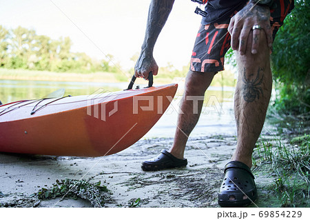 Close up shot of camping canoe on beach 69854229