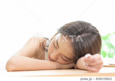 Asian women sleeping and sweet dream on white bed in bedroom 69859862
