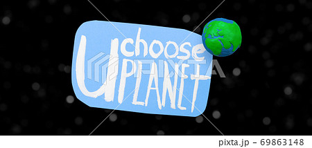 Plasticine Earth planet handmade and sticker with ecology text on black background with white stars bokeh. Ecology Concept for Earth Hour, Earth Day, Ocean Day and other ECO dates. Plasticine Earth planet handmade and sticker with ecology text on black background with white stars bokeh. Ecology Concept for Earth Hour, Earth Day, Ocean Day and other ECO dates. 69863148