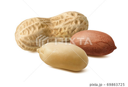 Raw peanuts in shells and skins isolated on white background. 69863725
