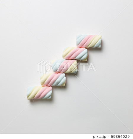 Stairs. Colorful marshmallow on white background. flat lay, top view Stairs. Colorful marshmallow on white background. flat lay, top view 69864029