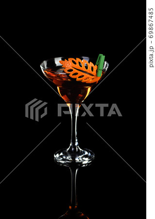 Cocktail Rob Roy .  Art in orange- fruits carving. 69867485