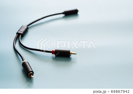 AV splitter cable connector and copy space on blue background color mood and tone style AV splitter cable connector and copy space on blue background color mood and tone style 69867942