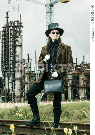 Young man weared in steampunk style 69868940