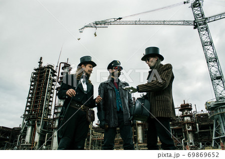 Three mans in steampunk style Three mans in steampunk style 69869652