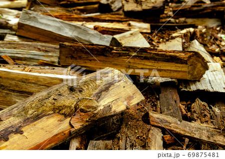 Abstractb background old aged dry fire wood timber planks pile chopped. Heating home concept. 69875481