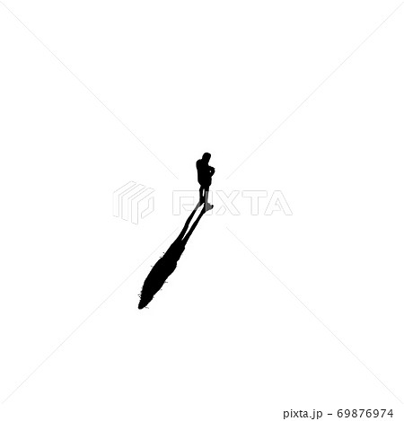 The man standing alone in the middle. The man standing alone in the middle. 69876974