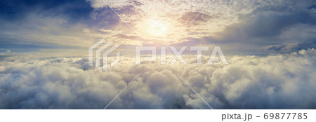 Panorama of Flying over the clouds. 69877785
