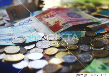 Close up view on kazakh and kyrgyz currencies banknotes and coins 69878183