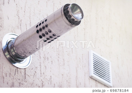 Munich plaster wall with gas chimney and ventilation hole Munich plaster wall with gas chimney and ventilation hole 69878184