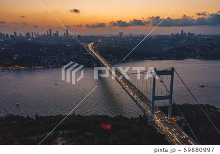 Istanbul Bosphorus Bridge at Dusk Sunset with Car traffic jam and City Skyline, Aerial View Istanbul Bosphorus Bridge at Dusk Sunset with Car traffic jam and City Skyline, Aerial View 69880997