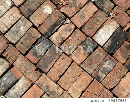 red old bricks laid in one plane 69887983