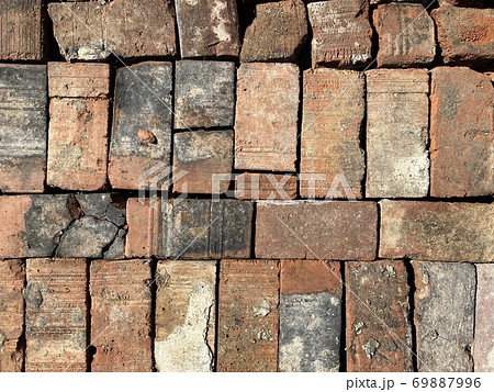 red old bricks laid in one plane 69887996