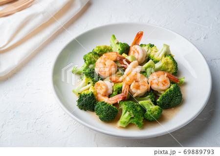 Stir Fried Broccoli with Shrimp in white plate Stir Fried Broccoli with Shrimp in white plate 69889793