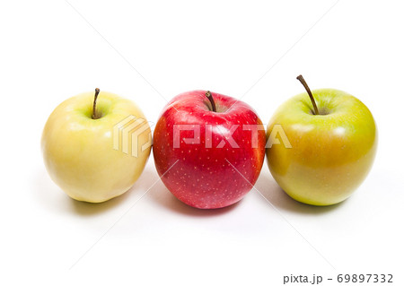 Group of ripe apples on a white background 69897332
