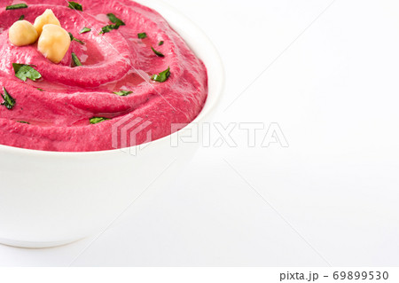 Beet hummus in a bowl isolated on white background Beet hummus in a bowl isolated on white background 69899530