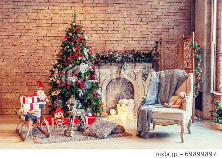 Classic christmas New Year decorated interior room New year tree and fireplace Classic christmas New Year decorated interior room New year tree and fireplace 69899897