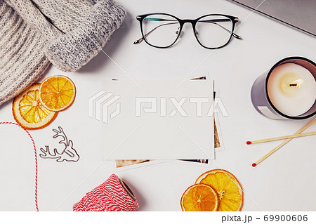 Christmas flat lay composition with candle, dry oranges and other 69900606