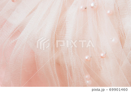 Beautiful pink tulle with shiny beads background 69901460